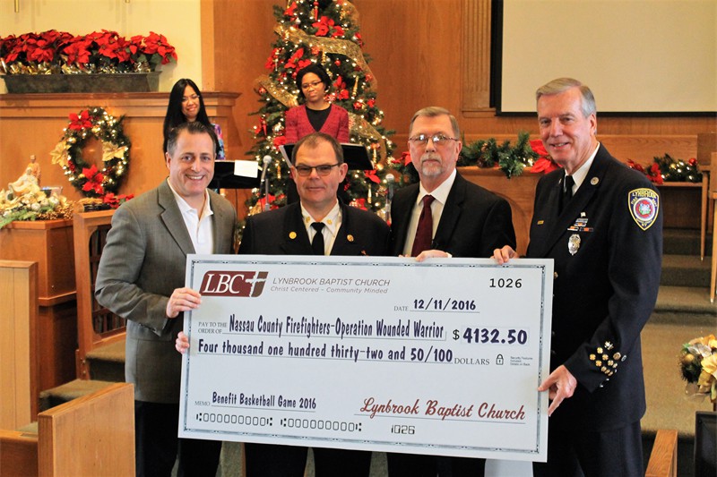 OWW Pastor presents check to all Dec2016
