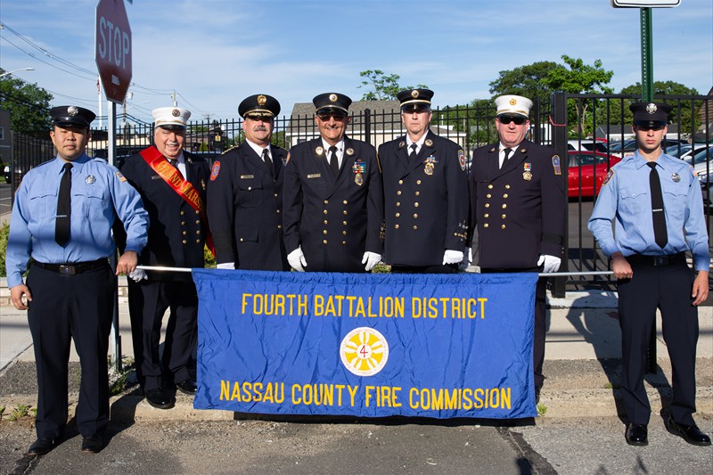 Fourth parade 4 060819 officers and     banner